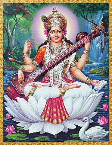 image of Saraswati sitting on a white lotus